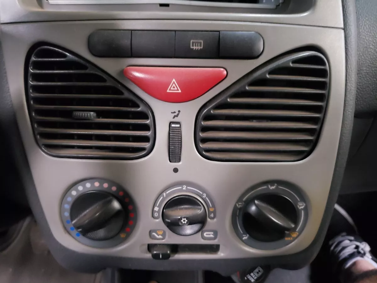 Moldura_Central_Com_Difusor_Fiat_Palio_2011_Eco_Pe_as_V_ema_image2