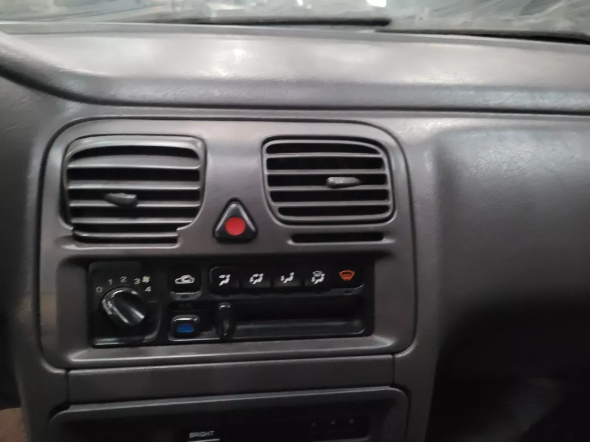 Moldura_Central_Subaru_Legacy_2_0_1995_C_detalhe_Eco_Pe_as_image2