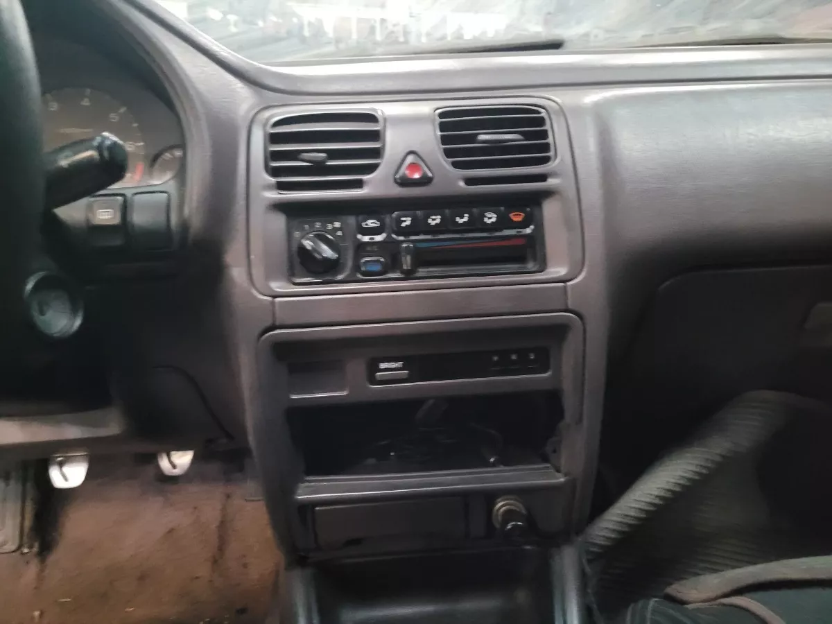 Moldura_Central_Subaru_Legacy_2_0_1995_C_detalhe_Eco_Pe_as_image3